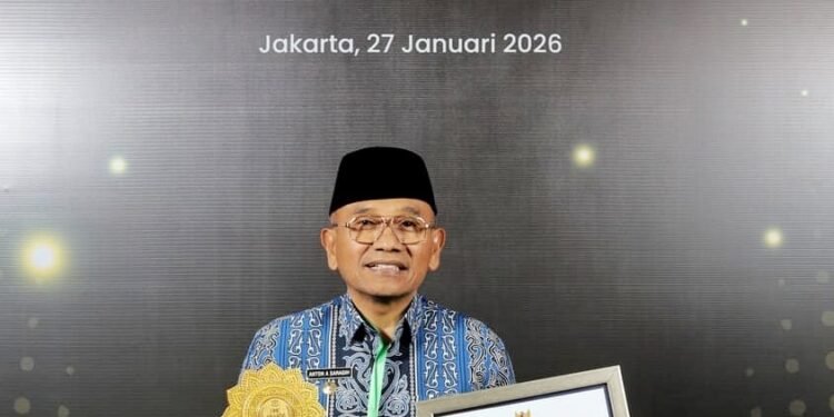 Pemkab Simalungun Terima Penghargaan UHC Kategori Madya: Capaian Kepesertaan Tembus 101,67%