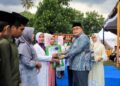 Walikota Pematangsiantar Menyerahkan Piala Para Juara MTQN Tingkat Kecamatan Siantar Martoba
